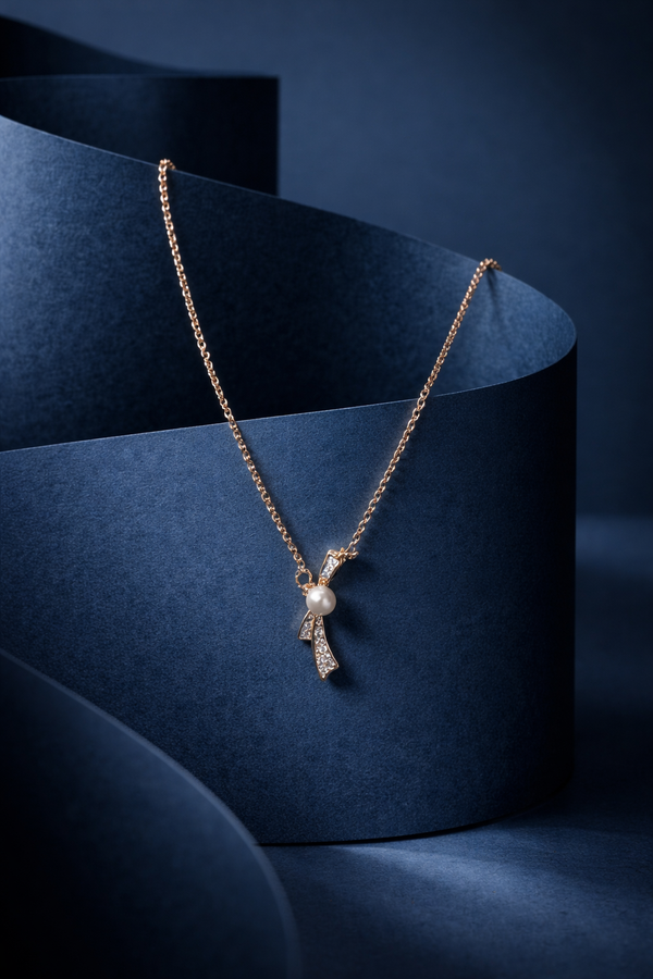 Pearl Bow Pendant Necklace – Gold Finish