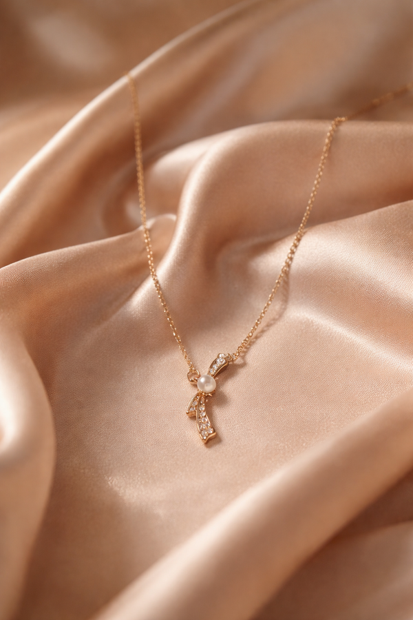Pearl Bow Pendant Necklace – Gold Finish